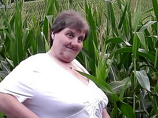 Old fat BBW mother fucks herself outdoor